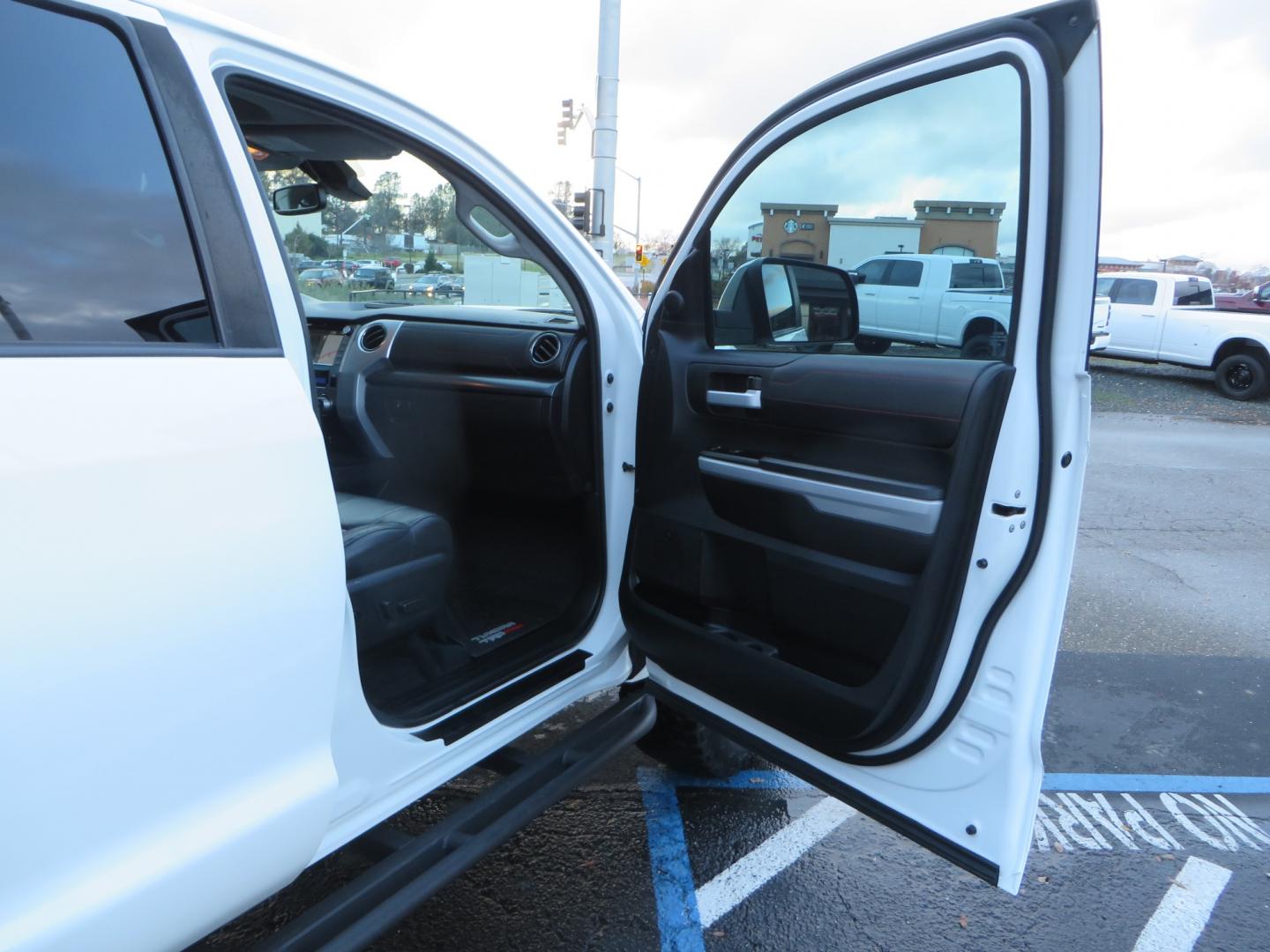 2020 White /BLACK Toyota Tundra SR5 5.7L V8 CrewMax 4WD (5TFDY5F12LX) with an 5.7L V8 DOHC 32V engine, 6A transmission, located at 2630 Grass Valley Highway, Auburn, CA, 95603, (530) 508-5100, 38.937893, -121.095482 - Clean tundra featuring a level kit, Icon Vehicle Dynamicxs upper control arms, 18" Method NV wheels, 35" BFG KO2 tires, Rocksliders, Retrax bedcover, Rigid Industries fog lights, RoadActive Suspension Custom Leaf Spring Enhancement Kit. - Photo#44